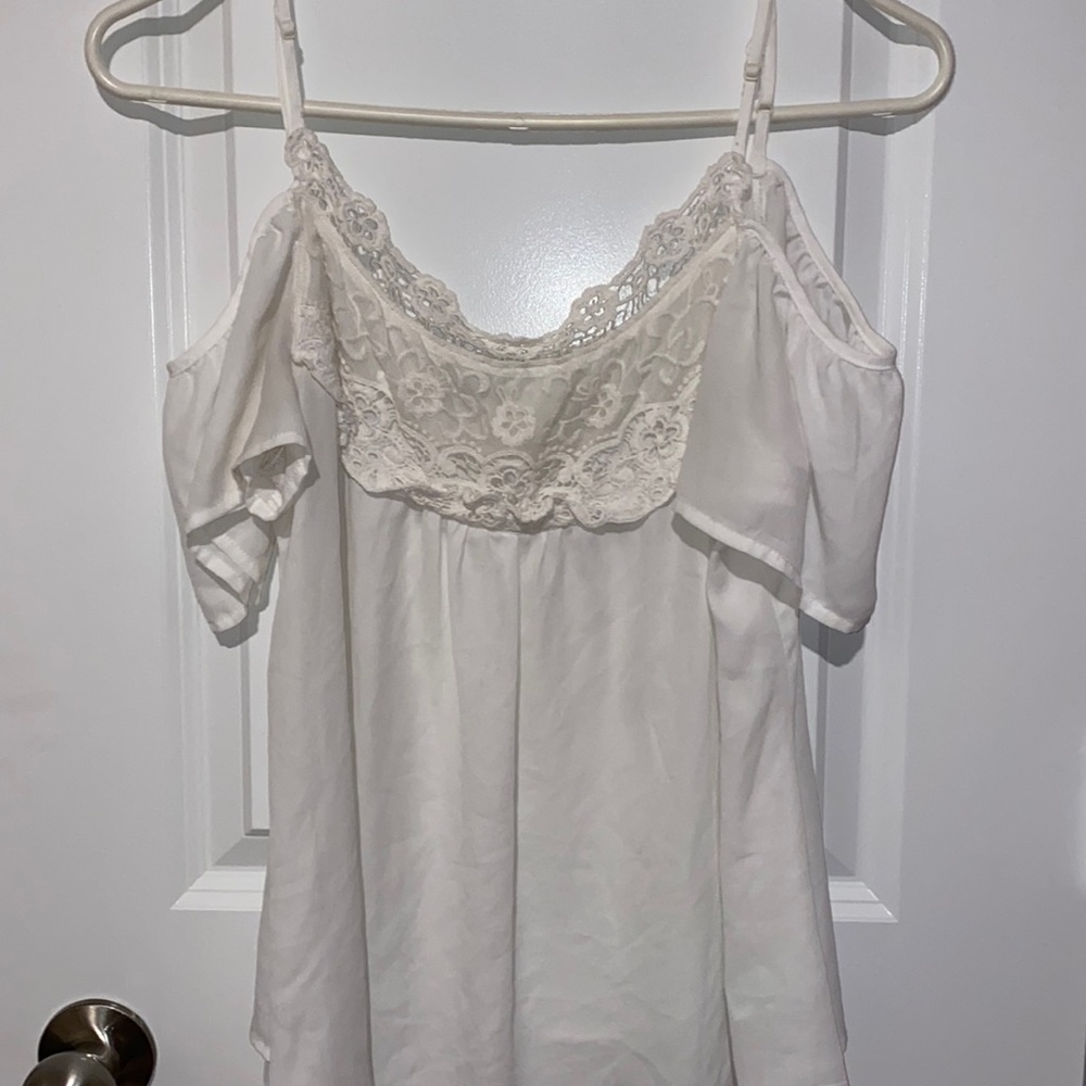 white flowy too with peep shoulders. size small.